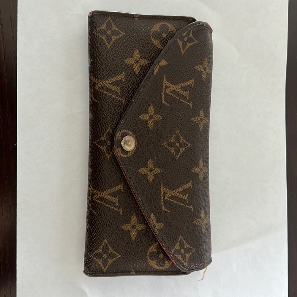 Wallet, Simply a cute wallet. Comes with box and bag. Has some wearing.